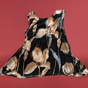 Sleeveless flare top made from viscose. NWT.